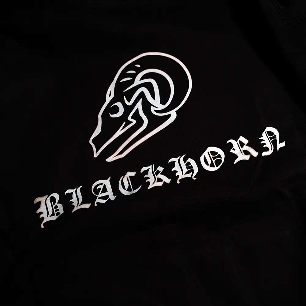 Close-up of BLACKLETTER Hoodie showcasing distressed gothic “BLACKHORN” lettering and Blackhorn skull logo with burnt-edge detailing.