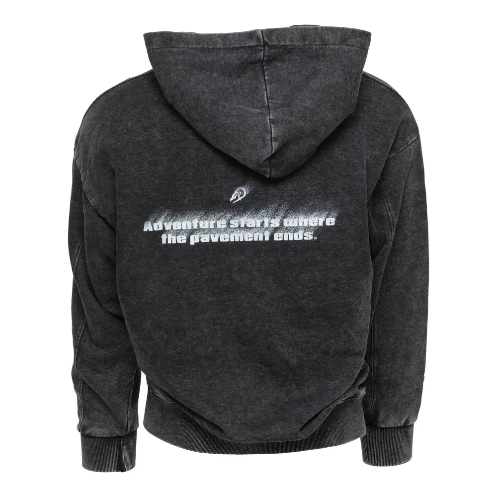 Back view of PAVEMENT ENDS Hoodie featuring spray-fade slogan “Adventure starts where the pavement ends” and Blackhorn Skull graphic.