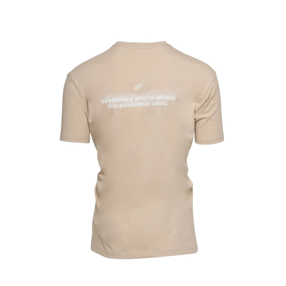 Rear view of Pavement Ends T-Shirt in Tan with spray-fade back graphic and “Adventure starts where the pavement ends” text.