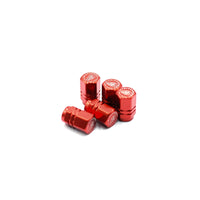 Pack of five red Blackhorn valve stem caps on white background.