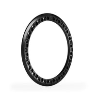 Corner angle black anodized beadlock ring showing open windows and recessed hardware pockets.